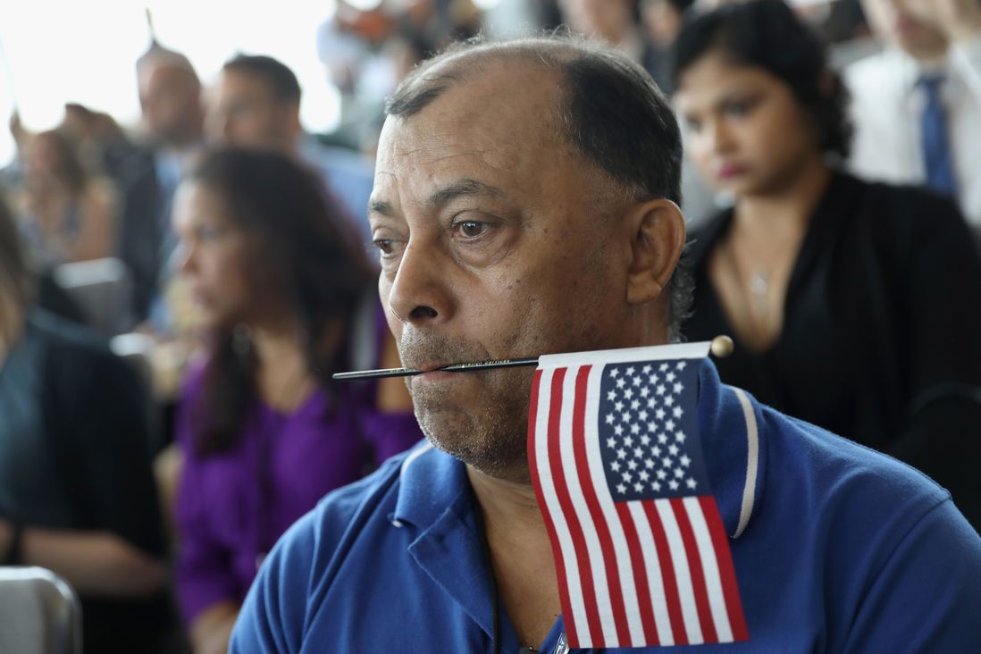Family members watch as their loved ones take part in a naturalization ceremony held in the observatory of the One World Trade Center<br>
